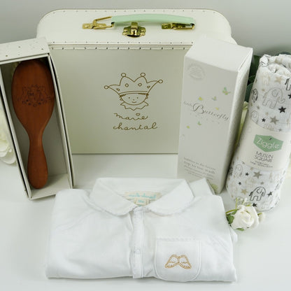 Luxury Marie- Chantal Baby Suitcase, Luxury Angel Wings white Baby sleepsuit. baby natural wooden hairbrush in heirloom box, White and grey muslin with elephants, Butterfly London baby toiletries