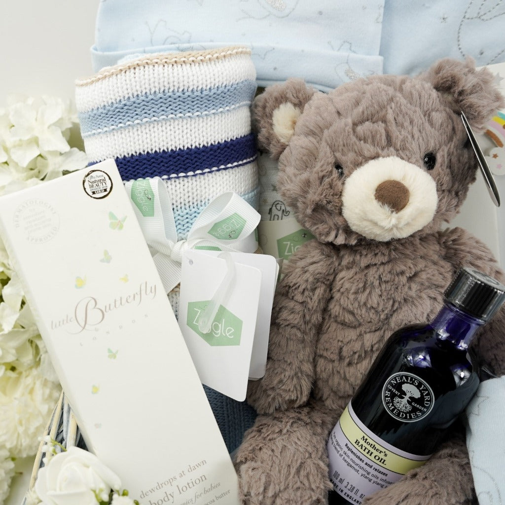 Butterfly london baby lotion, Neals yard mothers bath oil , soft brown teddy bear and striped baby boy blanket