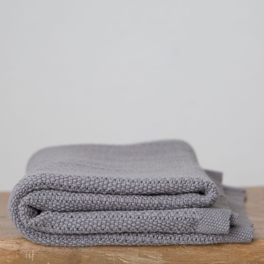 Grey baby cellular blanket in a natural box