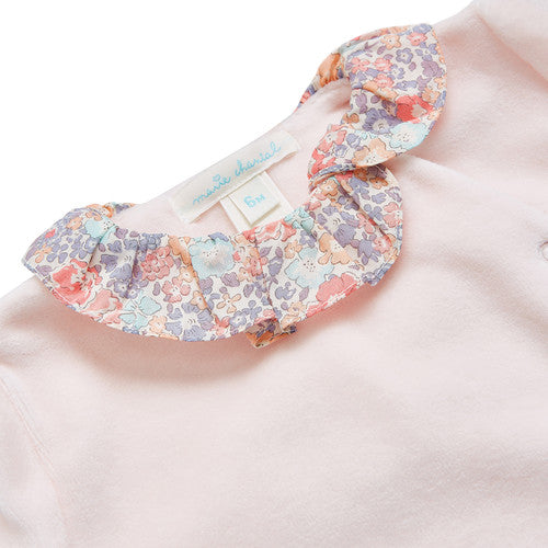 Pink velour baby sleepsuit with liberty print ruffle collar , liberty print angel wings and ruffle around the sleeve comes in a beautiful Marie Chantal gift box a