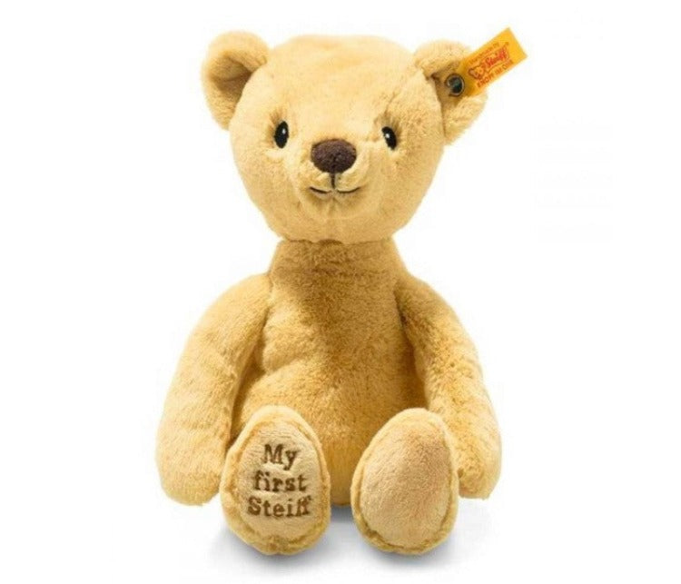 Soft brown baby's first steiff teddy with button in the ear and embroided foot with the words My first steiff