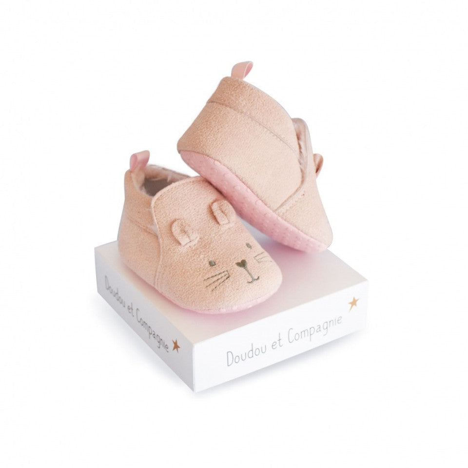 Soft pink baby booties with cute ears and embroidered face