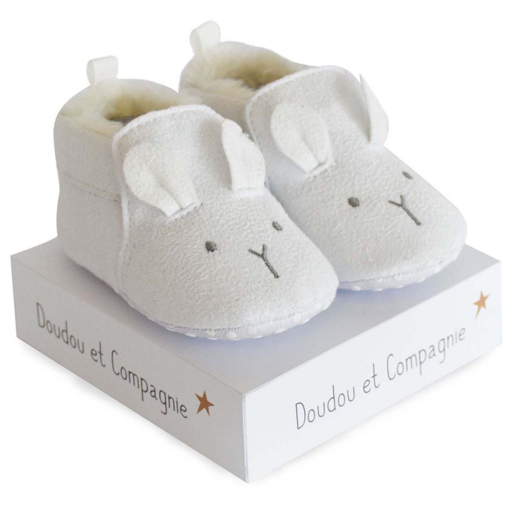 Cute white baby soft slippers with an embroidered face and ears 